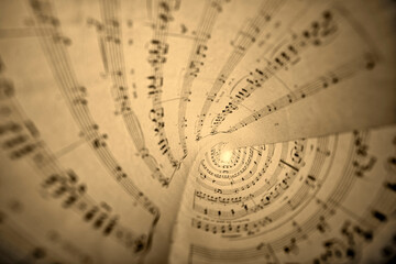 View inside a cone from a music score sheet. Sepia toned.