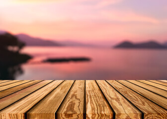 Fototapeta na wymiar Wooden table top on colorful sky on the lake in countryside at evening