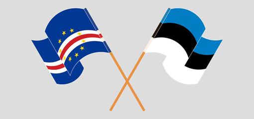 Crossed and waving flags of Cape Verde and Estonia