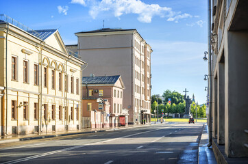 Buildings on Volkhonka Street and a monument to Prince Vladimir on Borovitskaya Square in Moscow