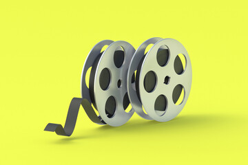 Film reel in metal frame on yellow background. Cinematography tape. Retro technology. Cinema premiere. Documentary shooting. 3d render