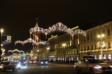 Fototapeta na wymiar New Year's illumination of Nevsky Prospekt and the City Duma building in the night St. Petersburg