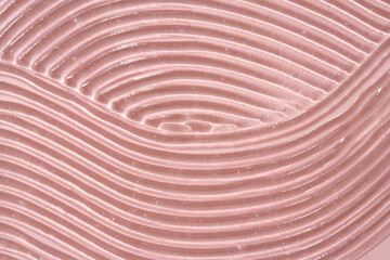 Aloe vera gel on pastel pink background. Healthy natural skin product.