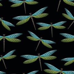 Dragonfly ornamental seamless pattern. Repeating dress fabric print with damselfly insects. Close