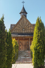 Fototapeta premium A small wooden cemetery church in Banska Wyzana in Podhale