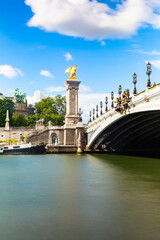 Day long exposure view of Alexandre III bridge in Paris - France
