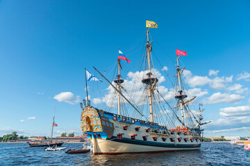 Side view of the Russian old military sailing ship Poltava, parked on the Neva River against the...