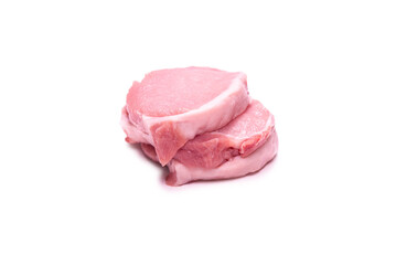 Raw pork pieces isolated on a white background.