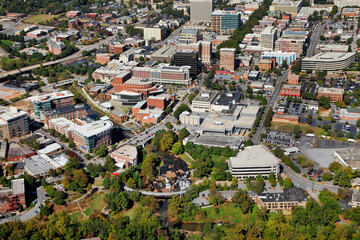 Fototapeta premium Aerial view of buildings and road systems in downtown Greenville, SC