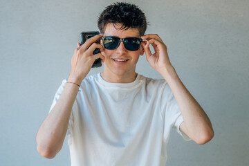 portrait of teen boy with sunglasses