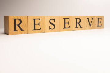 The name Reserve was created from wooden letter cubes. Economics and finance.