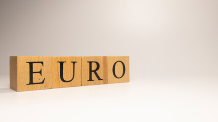The name Euro was created from wooden letter cubes. Economics and finance.