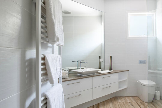 Modern bathroom with heated towel rail