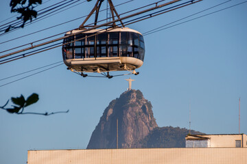 Christ the Redeemer and the Sugar Loaf Cable Car in Rio de Janeiro Brazil. - obrazy, fototapety, plakaty