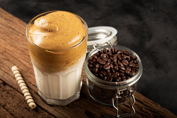 Iced Dalgona Coffee, glass with milk and coffee cream.