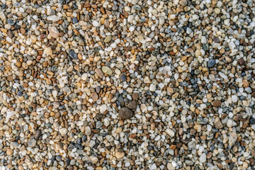 The texture of coarse sand near. Macro.