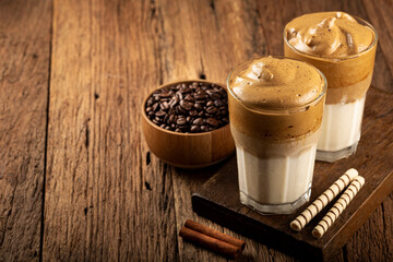 Iced Dalgona Coffee, glass with milk and coffee cream.