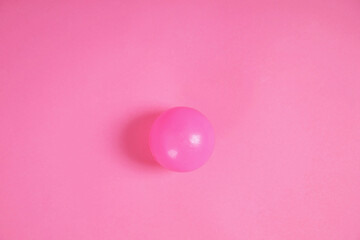 it a pink ball on pink scene