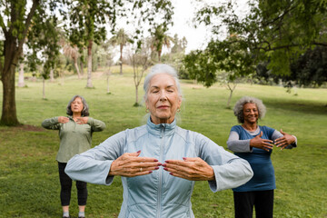 Empowered Women Practice Yoga in the Park