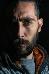 model man looking at camera, vertical photo.