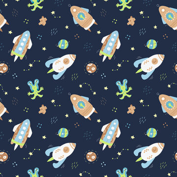 Space seamless vector pattern with hand drawn rockets, stars and planets for kids.