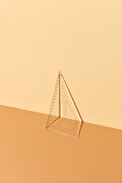 One transparent triangle plastic ruler