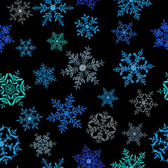 Seamless pattern of complex Christmas snowflakes in blue and gray colors on dark background