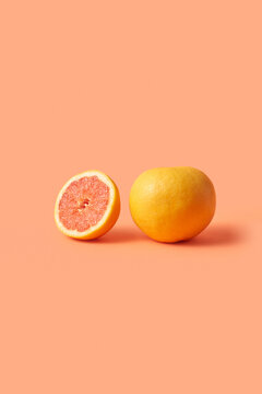 Cut and whole grapefruit