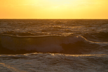 Sunrise on Atlantic Ocean Waves in Cape Cod