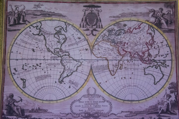 Closeup of an old illustration of a world map in two spheres