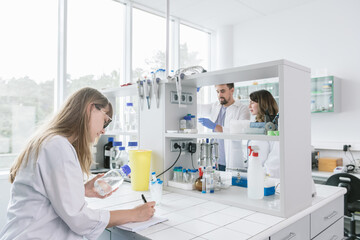Many People Working In Modern Lab