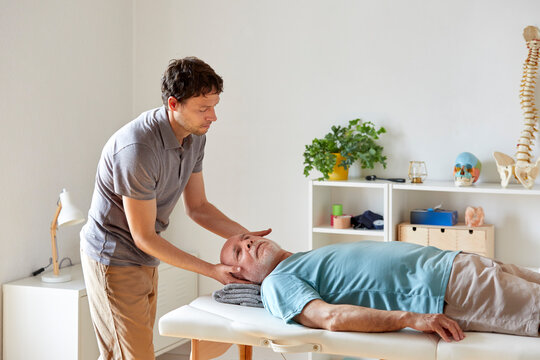 An osteopath treating cervical pain 