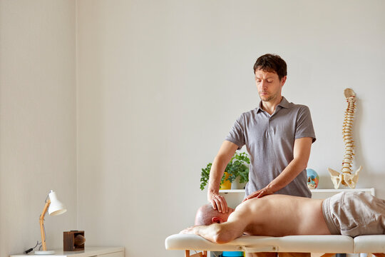 An osteopath unlocking a neck