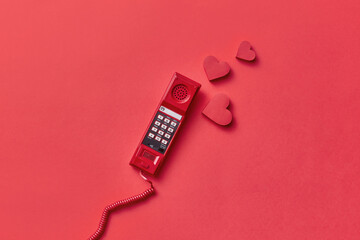 Vitage red telephone handset with hearts