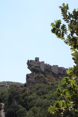 Fototapeta na wymiar Roccascalegna and its castle on the mountain
