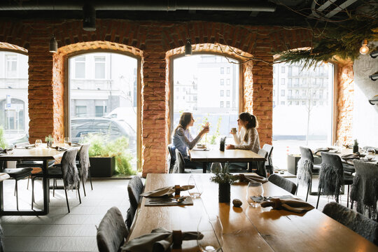 People Enjoying Time At Meeting At Cafeteria