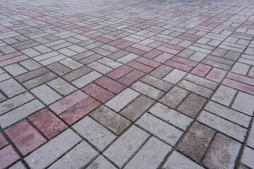 pavement pattern made of paving stone tiles with textured surface outdoors