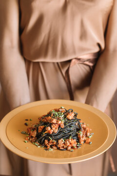 Anonymous Woman Holding Squid Black Ink Spaghetti 