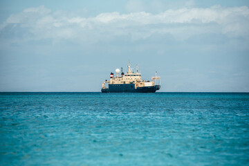 Rusty old boat in the meddle of the sea