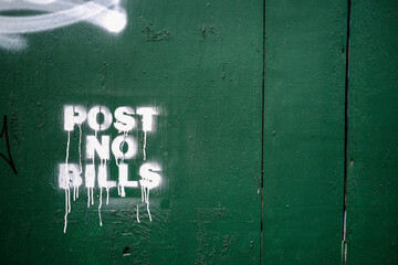 Post No Bills message on a wooden hoarding in New York CIty