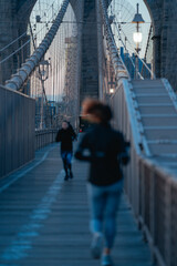 people walking on the bridge Brooklyn new York travel sport morning sunrise cold 