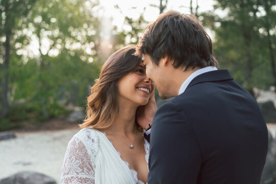 Bride and groom celebrating small wedding in nature