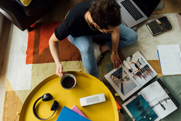Young Female Student Browsing Magazines