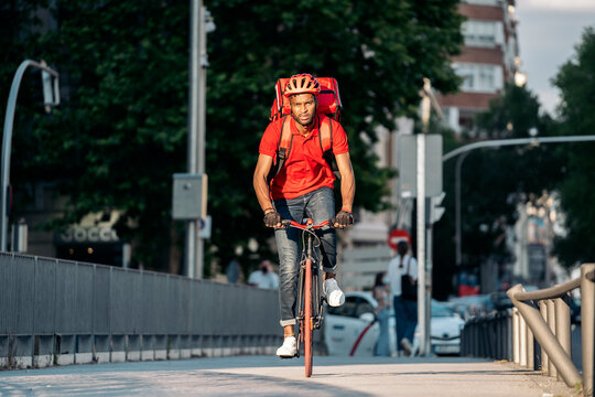African Delivery Man Riding Bike