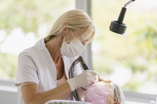 Cosmetologist doing micropigmentation
