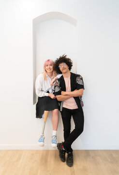 Cheerful Portrait Of Woman With Leg Prosthesis And Man 