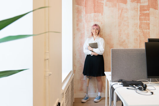 Portrait Of Woman With Leg Disability 