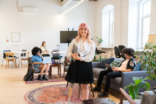 Self-confident Woman With Leg Prosthesis At Co-working.