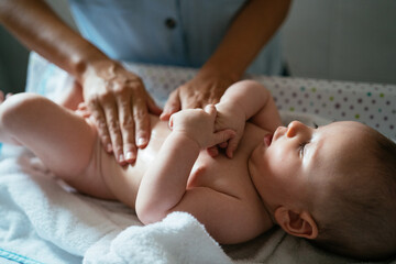 Baby Having A Skincare Massage From Her Mother