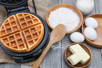 Freshly made waffles on the kitchen table.